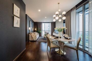 A modern, well-lit living room with dining area