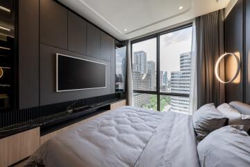 Modern bedroom with large window