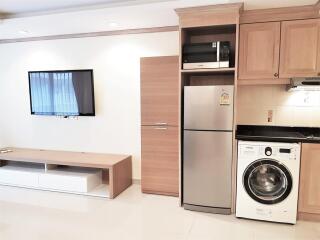 Modern kitchen area with appliances