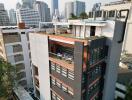 Modern apartment building with rooftop terrace