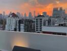 City skyline view from balcony at sunset