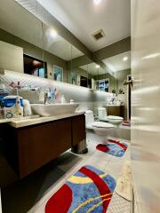 Modern bathroom with dual sinks and bright decor