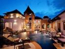 Luxurious villa with pool at dusk