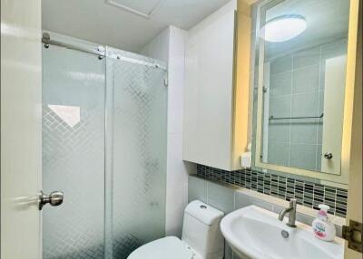 modern bathroom with shower and vanity area