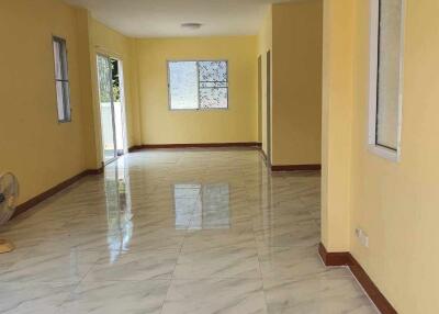 Spacious living room with large windows