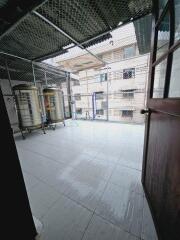 Enclosed outdoor area with water tanks