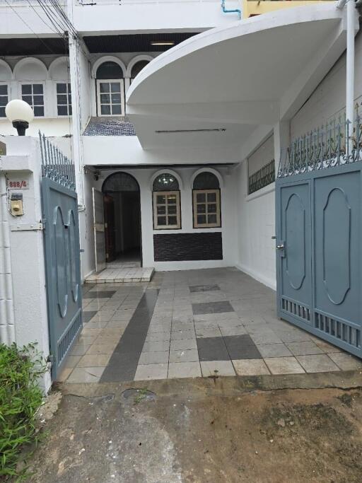 Front entrance with gated driveway