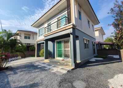 Modern two-story house with gated entry