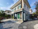 Modern two-story house with gated entry