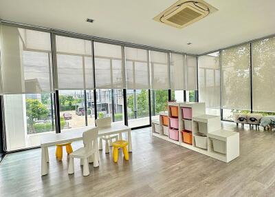 Modern playroom with large windows