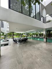 Spacious communal outdoor area with swimming pool and seating