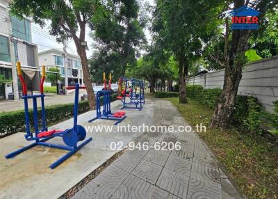 Outdoor gym area with exercise equipment