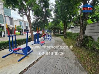 Outdoor gym area with exercise equipment