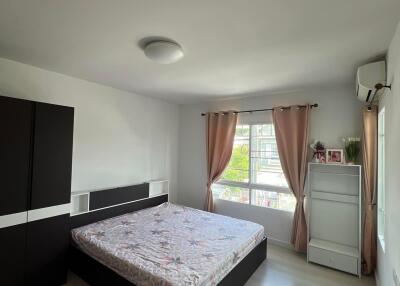 Bedroom with modern furniture and natural light