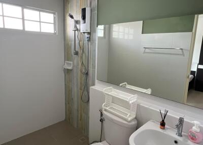 Modern bathroom with shower and fixtures