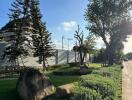 Beautifully landscaped outdoor space with trees and pathway