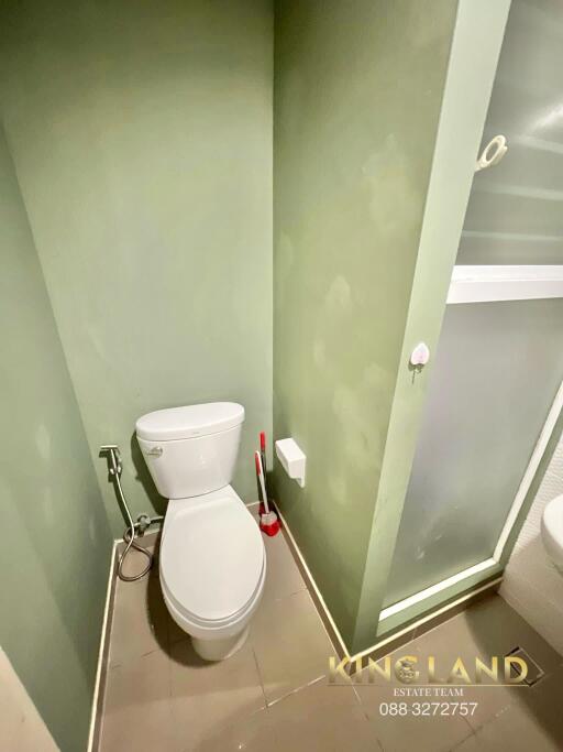 Compact bathroom with toilet and shower