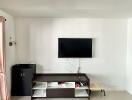 Modern living room with wall-mounted TV