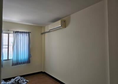 Empty bedroom with air conditioner