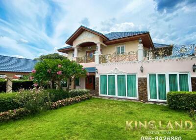 Two-story house with garden