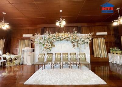 Event room with chairs and floral arrangement