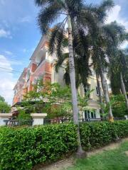 Exterior view of a residential building with garden