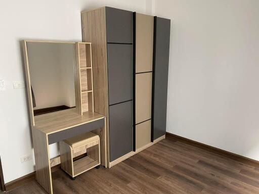 Modern bedroom furniture with a wardrobe and dressing table