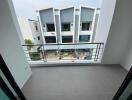 Balcony view overlooking neighboring buildings