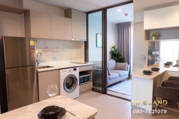 Modern kitchen with adjacent living area