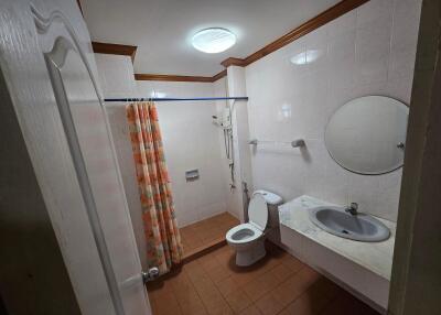 Bathroom with shower, toilet, and sink