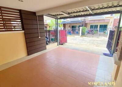 Covered carport with tiled floor