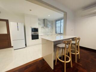 Modern kitchen with island and seating