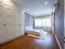 Spacious bedroom with built-in wardrobes