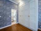 Bedroom with built-in wardrobe and adjoining bathroom