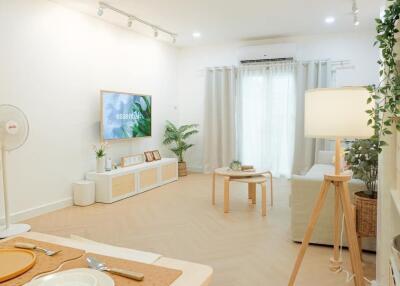 Modern living room with light furniture and decor