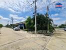 Street view of residential area with houses and greenery