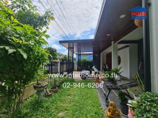 Front outdoor area with garden and driveway