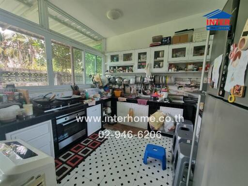 Spacious kitchen with modern appliances and ample storage