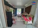 Living room with glass door, curtains, sofas, toys, and furniture