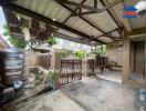 House exterior area with water tank and fenced space