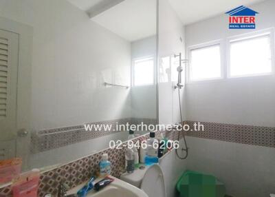 Bathroom with shower and toiletries