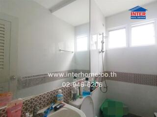 Bathroom with shower and toiletries