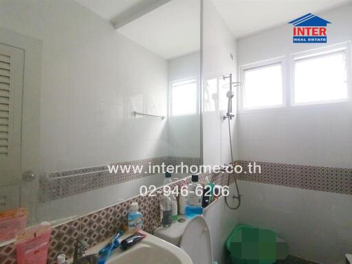 Bathroom with shower and toiletries