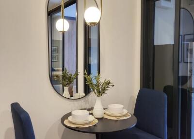 Cozy dining nook with round table and modern decor