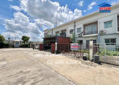 Two-story residential building in a gated community