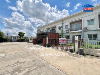 Two-story residential building in a gated community