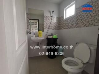 Compact bathroom with modern amenities