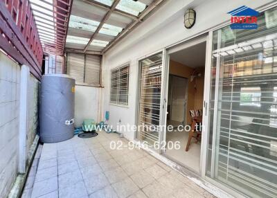 Spacious balcony with sliding glass doors