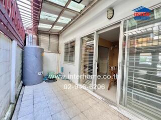 Spacious balcony with sliding glass doors