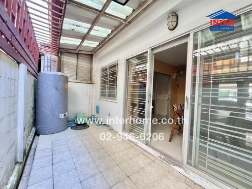 Spacious balcony with sliding glass doors